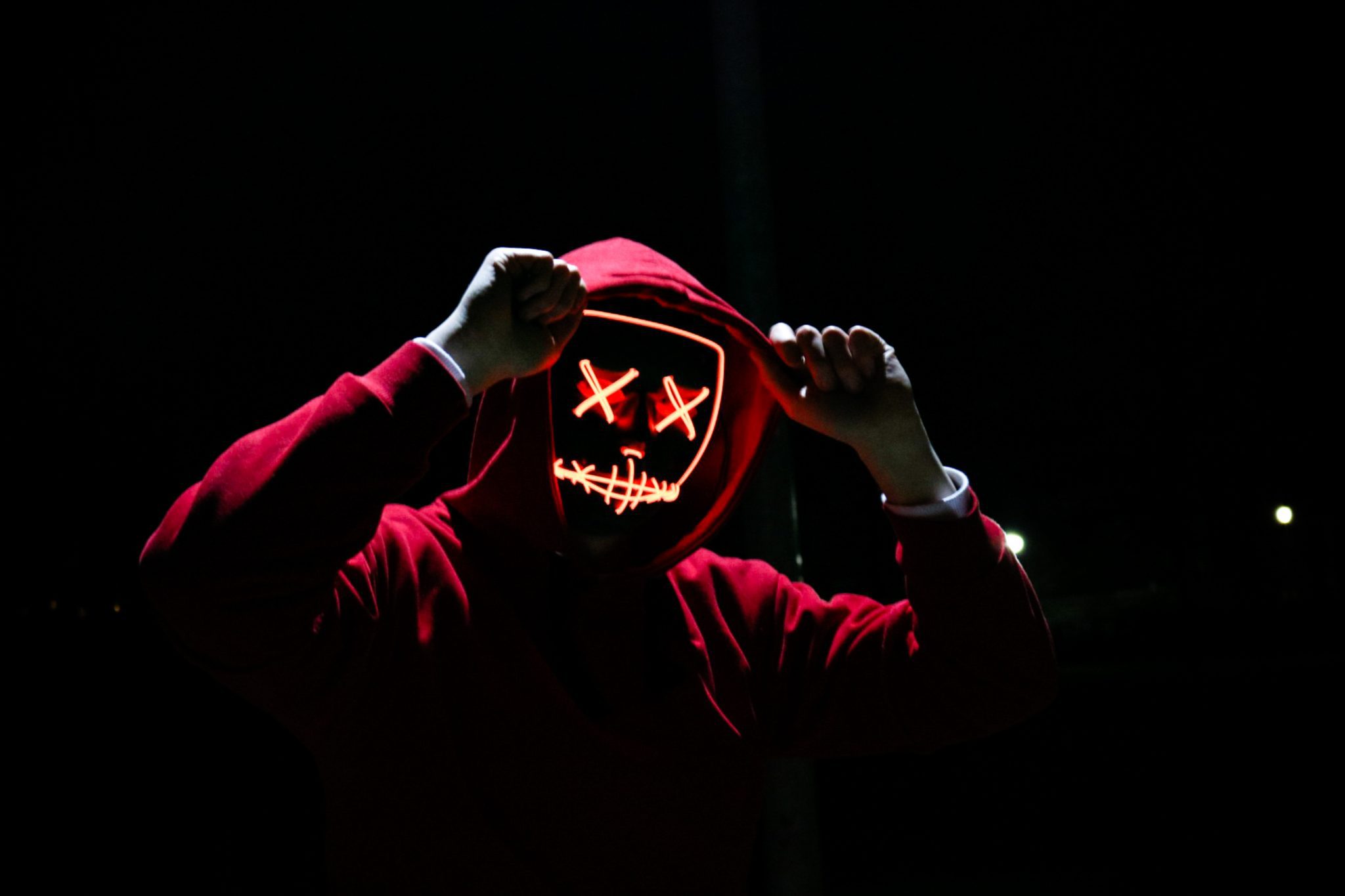 A picture of a shady figure in a hoody when an electronic mask; this is what modern piracy looks like when individuals can steal software or assets over the internet.