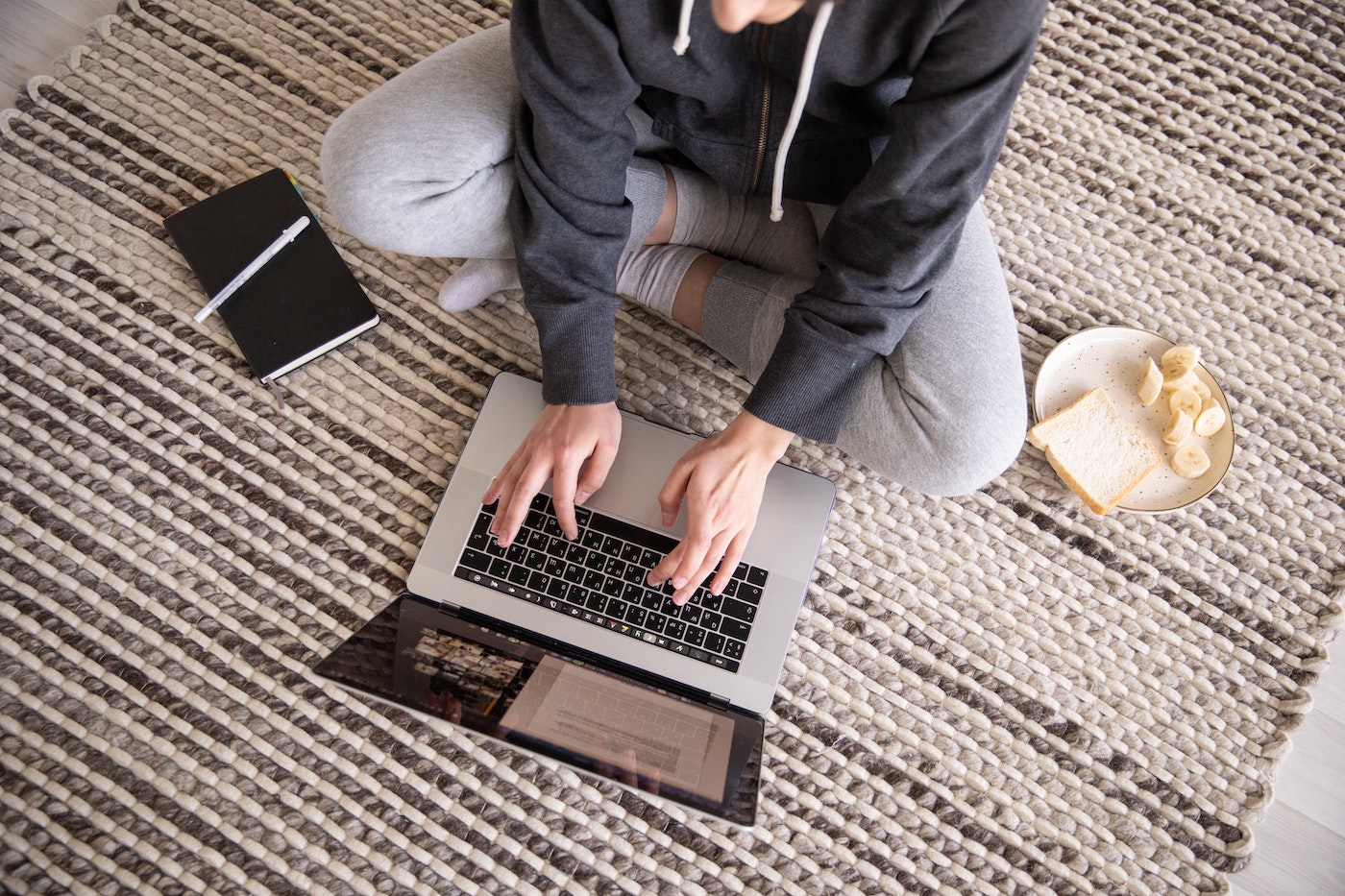 Image of person drafting email. Meant to represent the difference between CC vs BCC.