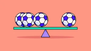 scale that appears to be balanced despite having different amounts of footballs on each side